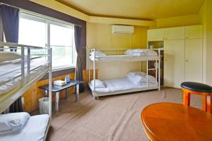 Voodi või voodid majutusasutuse Starry Sky Cottage 13 toas +46 fotot