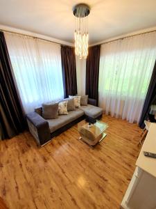 Posezení v ubytování Laura Apartments Sinaia