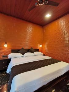 Postel nebo postele na pokoji v ubytování Betel Brooks Resort