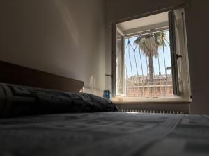 Postel nebo postele na pokoji v ubytování Hd Guesthouse Oasi urbana con parcheggio privato gratuito, fronte stazione