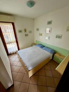 Postel nebo postele na pokoji v ubytování Lampedusa 119