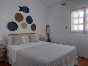 Ένα ή περισσότερα κρεβάτια σε δωμάτιο στο Casa Mimosa with private pool & garden