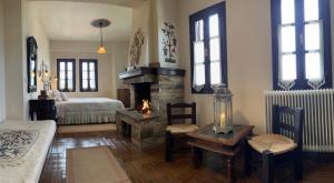 Postel nebo postele na pokoji v ubytování Guesthouse Filokalia