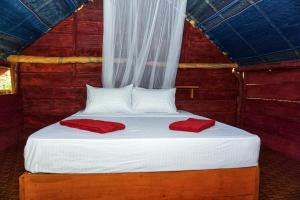 Voodi või voodid majutusasutuse Rana Treehouse toas