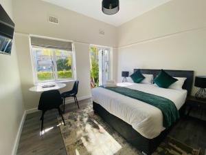 Ένα ή περισσότερα κρεβάτια σε δωμάτιο στο @Nine