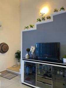 TV a/nebo společenská místnost v ubytování Duplex 3R2B Eclipse Residence
