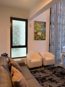Posezení v ubytování Duplex 3R2B Eclipse Residence