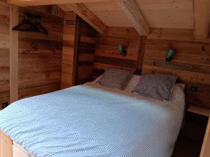 Postel nebo postele na pokoji v ubytování Chalet rinette