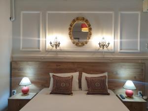 Ένα ή περισσότερα κρεβάτια σε δωμάτιο στο Cemberli House