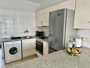 Kuchyň nebo kuchyňský kout v ubytování Yialos Village by Cybarco + 8 fotografií