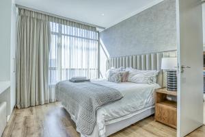 Postel nebo postele na pokoji v ubytování Luxurious 2-bedroom Apartment in Sandton