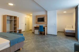 Postel nebo postele na pokoji v ubytování Martinez Hotel All Inclusive