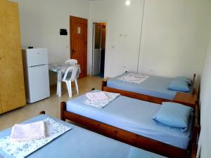 Postel nebo postele na pokoji v ubytování Spiro Guest House