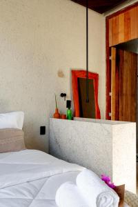 Cama ou camas em um quarto em Natu Boutique Stays