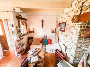 Χώρος καθιστικού στο Escapade Authentique Charme de la Pierre