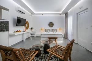 Μια τηλεόραση ή/και κέντρο ψυχαγωγίας στο Calma Luxury Studios & Suites