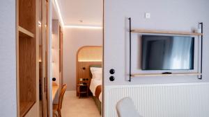 TV a/nebo společenská místnost v ubytování Alcázar Hotel Sóller