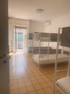 Postel nebo postele na pokoji v ubytování Lisa HOUSE