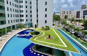 a rendering of a building with a swimming pool at Luxor Tambaú in Tambaú