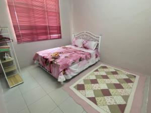 Ein Bett oder Betten in einem Zimmer der Unterkunft Homestay Rumoh Mok