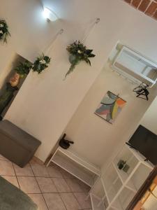 an overhead view of a staircase with flowers and plants at A CASA DI NINNI "Orsola room" in Turin