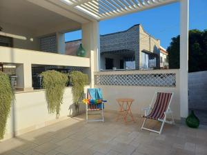A balcony or terrace at Villa Enza - A 150 passi dal mare