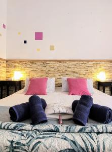 Letto o letti in una camera di Eden GuestHouse