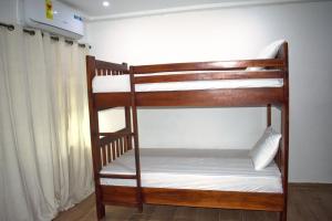 Una cama o camas en una habitación de Tree House Hostel