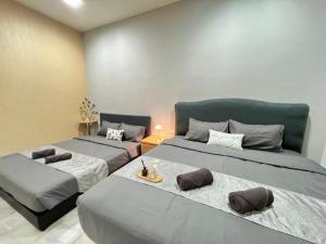 Katil atau katil-katil dalam bilik di YOLO4 4BR 10PAX CentralTown Netflix