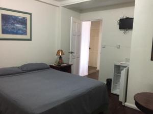 Voodi või voodid majutusasutuse Harbour Vista Inn toas