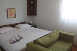 Posteľ alebo postele v izbe v ubytovaní Apartment Vita