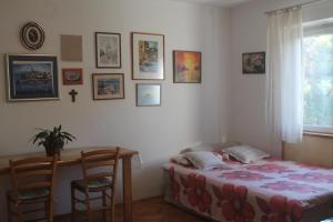 Posteľ alebo postele v izbe v ubytovaní Apartment Vita