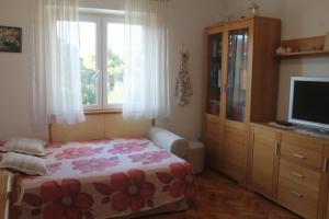Posteľ alebo postele v izbe v ubytovaní Apartment Vita