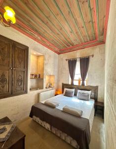 Postel nebo postele na pokoji v ubytování Solin Cave Cappadocia
