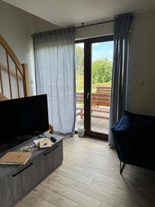 Posezení v ubytování Apartmány Černý vlk, Borová Lada