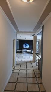 A television and/or entertainment centre at Уютные Апартаменты VIP PARK