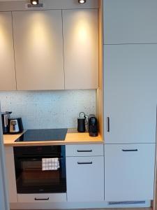 Η κουζίνα ή μικρή κουζίνα στο Apartament na Mierzei