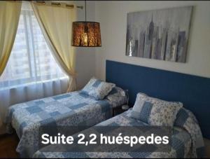 Postel nebo postele na pokoji v ubytování Terraza Santa Lucia,Suites "Como en su Casa"