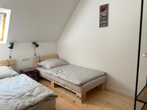 Ένα ή περισσότερα κρεβάτια σε δωμάτιο στο Ferienhaus Kuckuck 13 in Nieheim