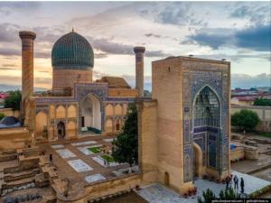 a large building with a dome on top of it at Safar Guest House in Samarkand