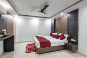Postel nebo postele na pokoji v ubytování Hotel Royal Inn igi