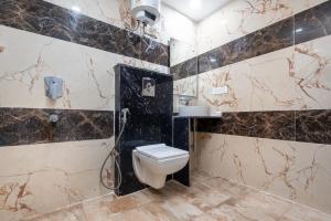 Koupelna v ubytování Hotel Royal Inn igi