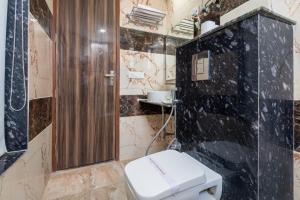 Koupelna v ubytování Hotel Royal Inn igi