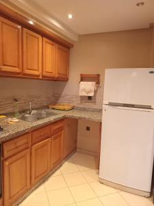 Η κουζίνα ή μικρή κουζίνα στο Superbe Appartement 2 chambres à AL FADL Marrakech +7 φωτογραφίες