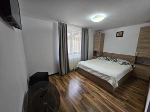 Ένα ή περισσότερα κρεβάτια σε δωμάτιο στο Casa Luca