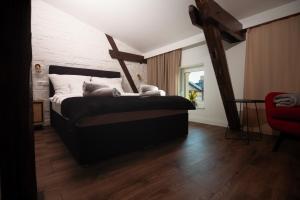 Łóżko lub łóżka w pokoju w obiekcie TS Apartamenty