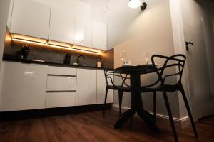 Kuchnia lub aneks kuchenny w obiekcie TS Apartamenty