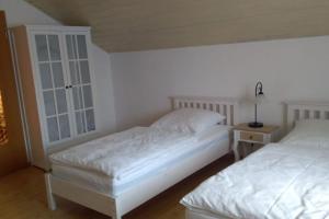 Postel nebo postele na pokoji v ubytování InnLiebe