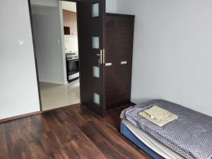 Postel nebo postele na pokoji v ubytování Apartament Domaniówka