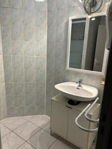 a bathroom with a sink and a mirror at proche de la source in Ouhans +12 photos